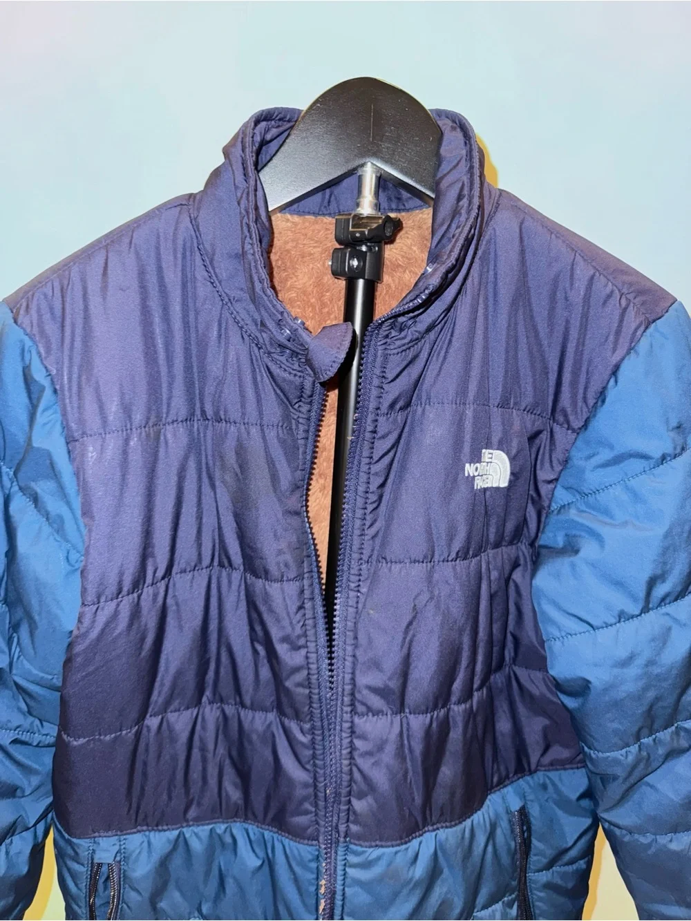 The North Face reversible puffer jacket with a soft, fleece lining, size 14/16
